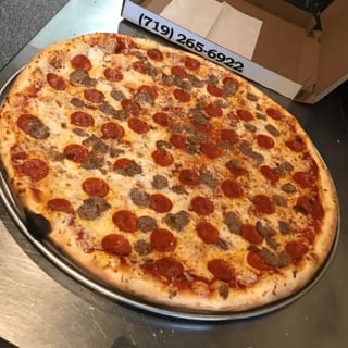 Home of the Big Apple Pizza (24")